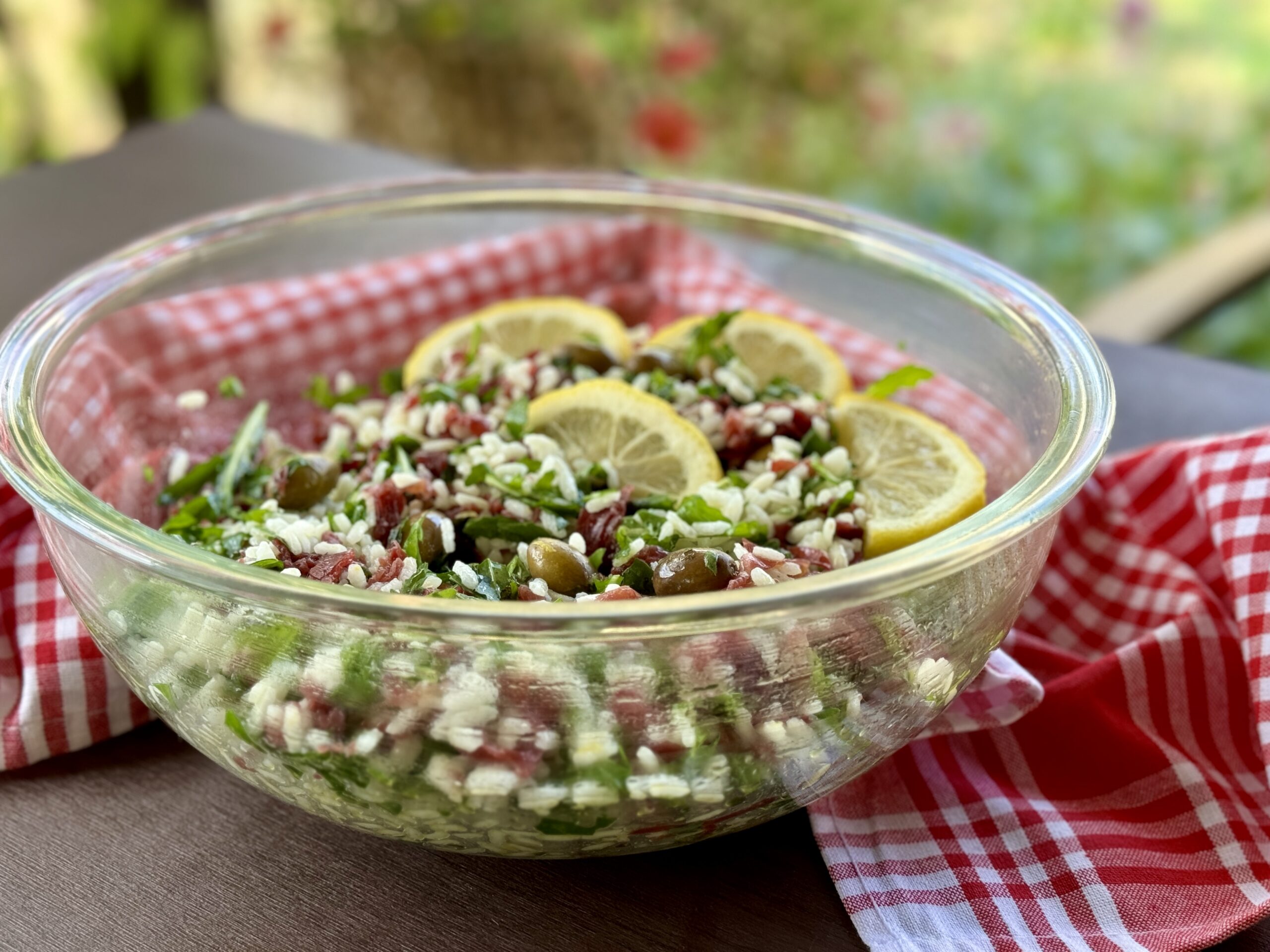 Riso con bresaola, rucola, limone e olive