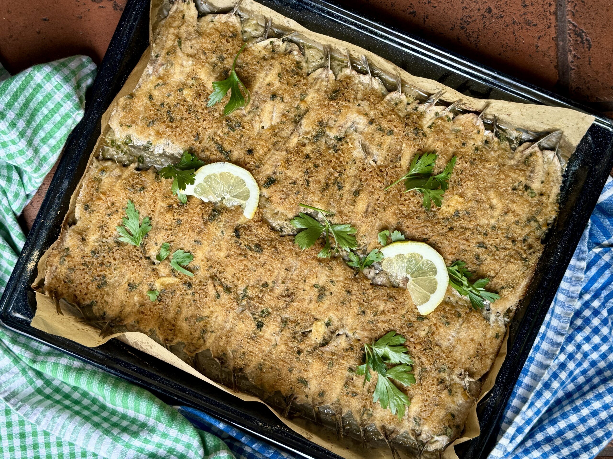 Acciughe al forno gratinate