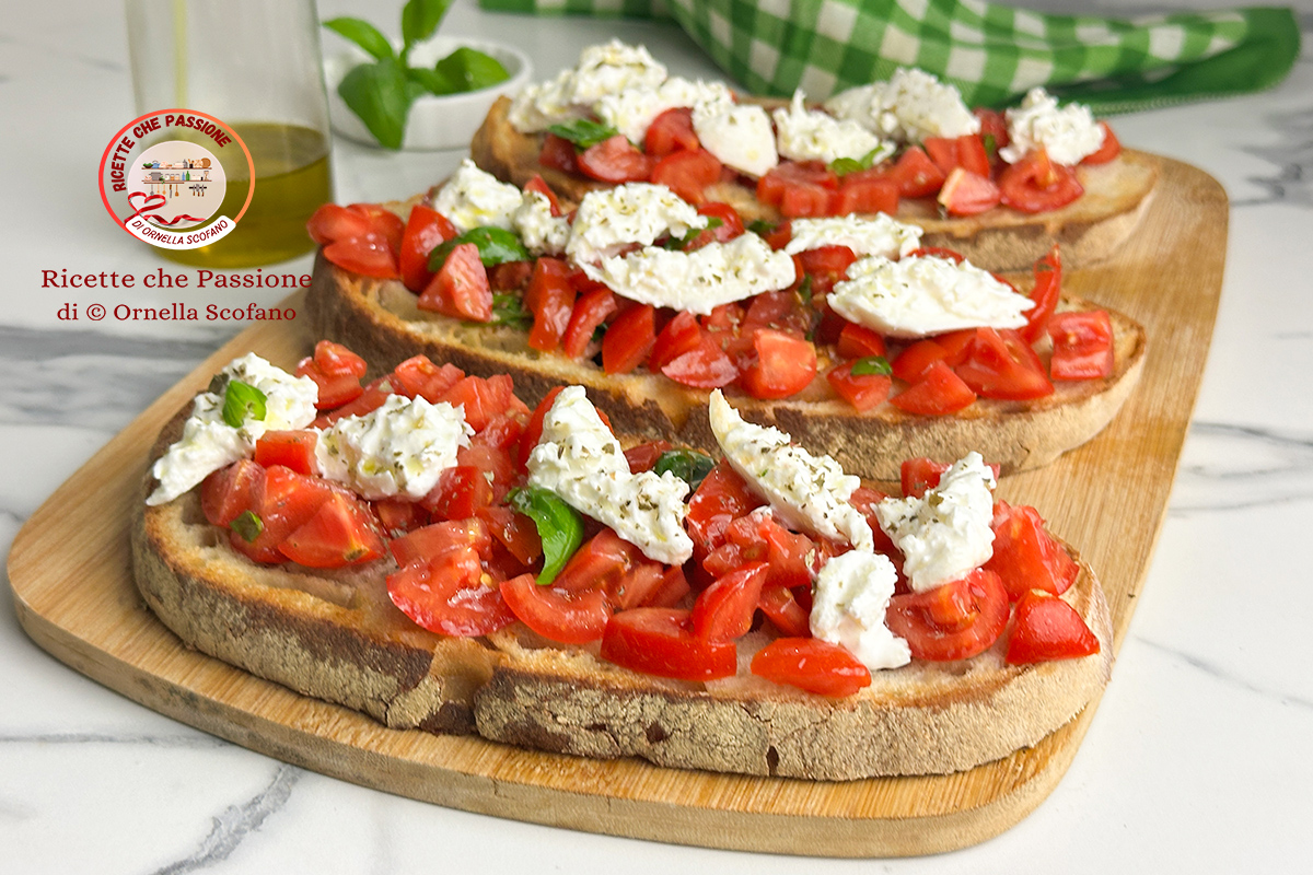 ricetta bruschetta con burrata pomodorini e basilico