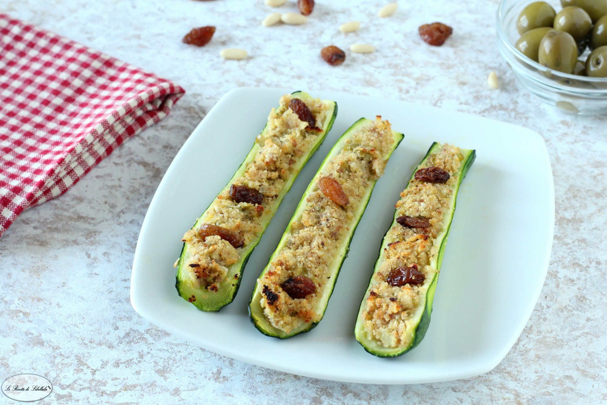 Zucchine ripiene con pinoli e uvetta