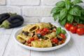 Paccheri cremosi con pomodorini melenzane e crema di mozzarella