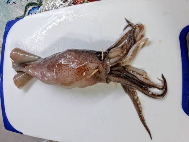 Totani grigliati ripieni di gamberoni