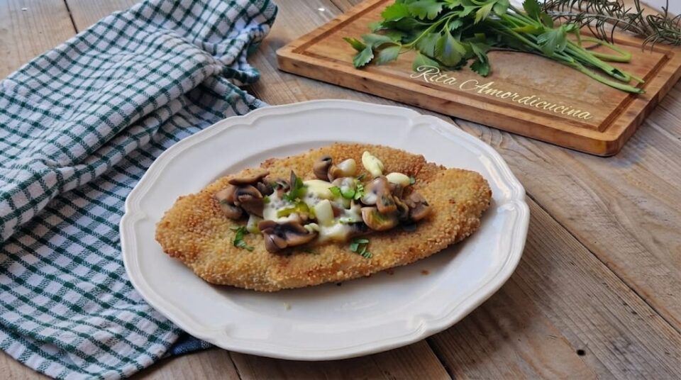 Cotoletta di pollo con funghi e mozzarella