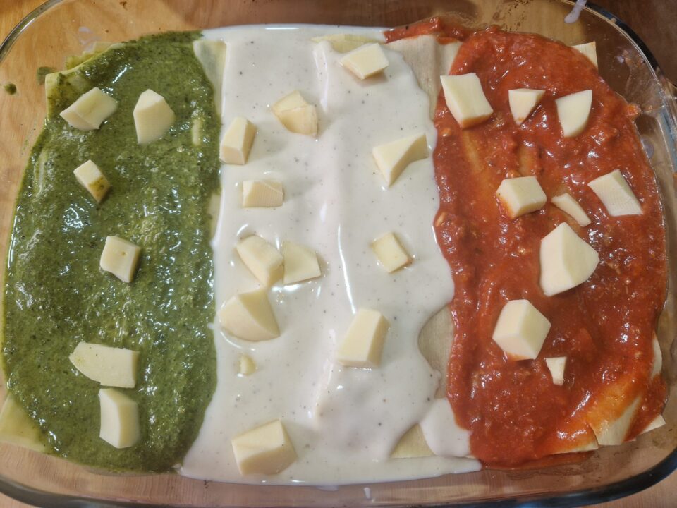 Lasagne ai tre colori con pesto, besciamella e ragù