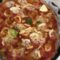 Pizza di Carne al Forno: la Ricetta Facile per riutilizzare il Pane Raffermo