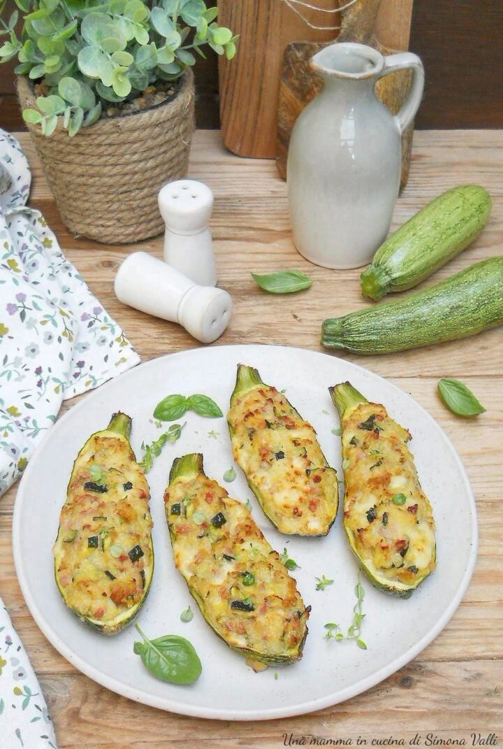 Zucchine ripiene facilissime, morbide e saporite con un delizioso cuore filante! Scopri la ricetta perfetta in forno o friggitrice ad aria.