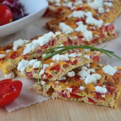 Frittata di pomodorini al forno con feta ricetta antipasto stuzzichino fingerfood secondo panino al sacco secondo con formaggi verdura vegetariano semplice ecnomico gustoso
