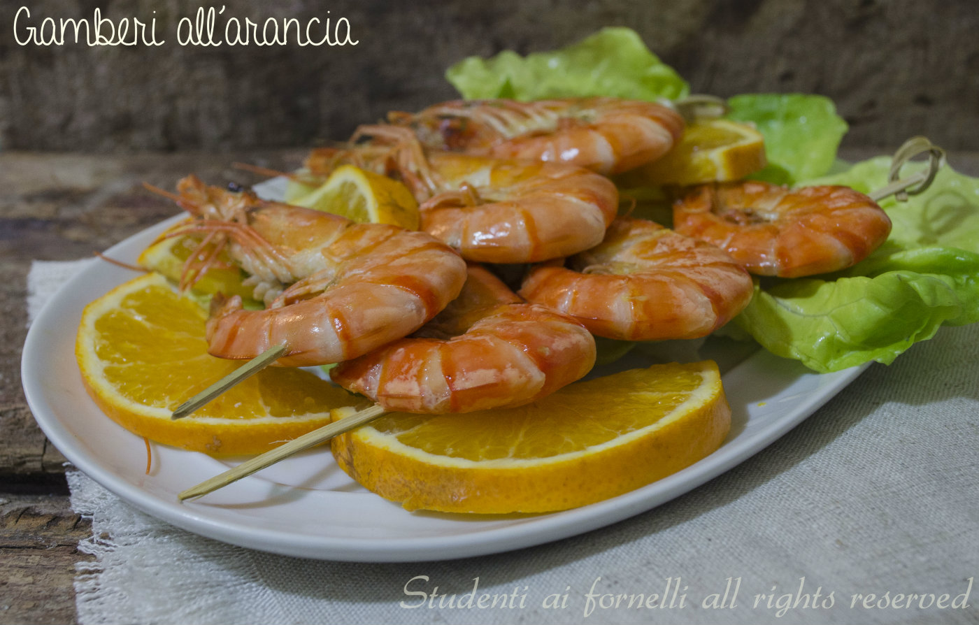 Gamberi all'arancia marinati cotti in padella, ricetta