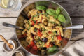 Pasta fredda con melanzane, pomodorini e basilico