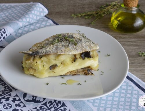 Filetti di sardine con patate melanzane e formaggio