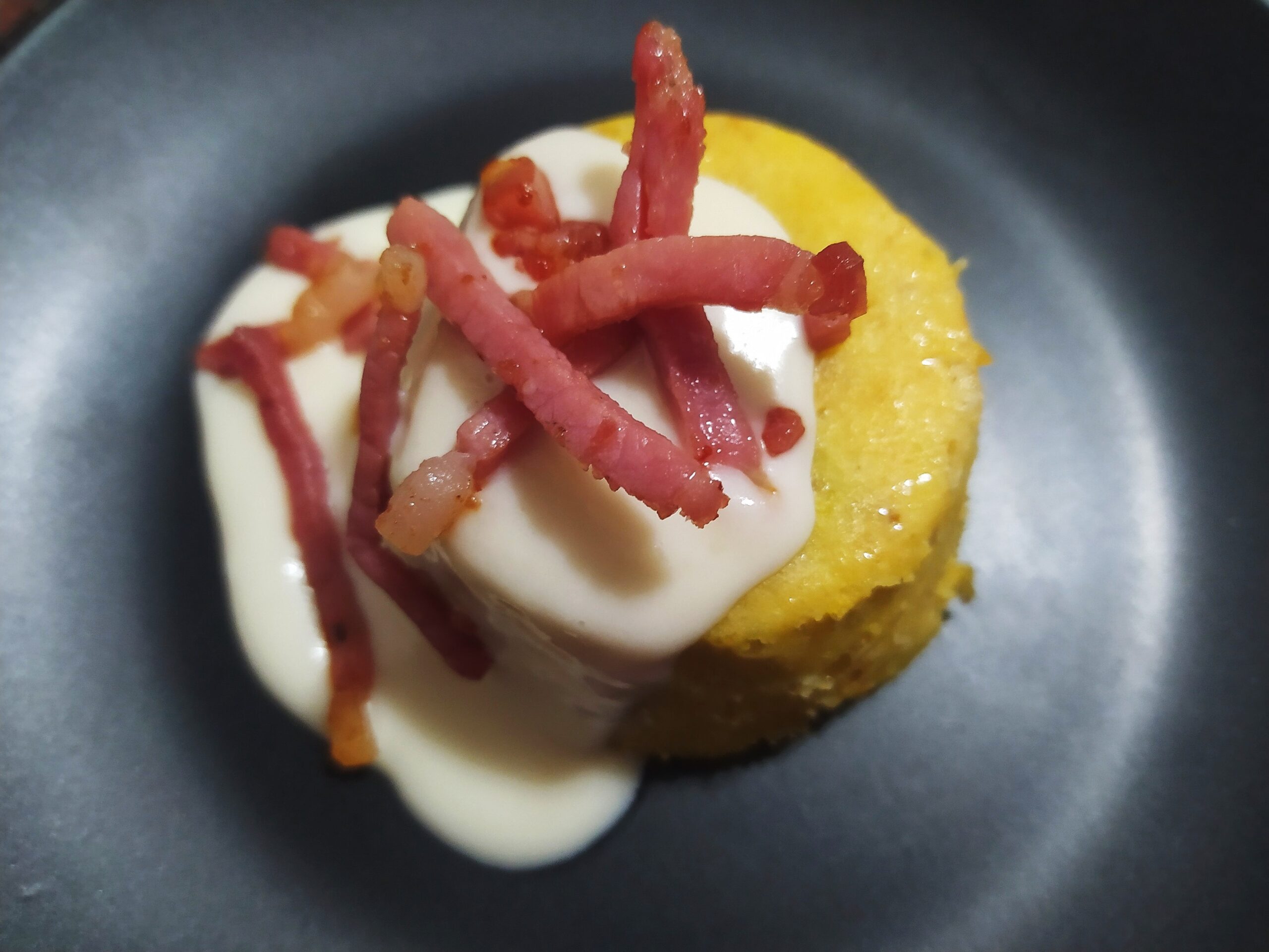 ricettaSformato di porri con fonduta di parmigiano e speck croccante