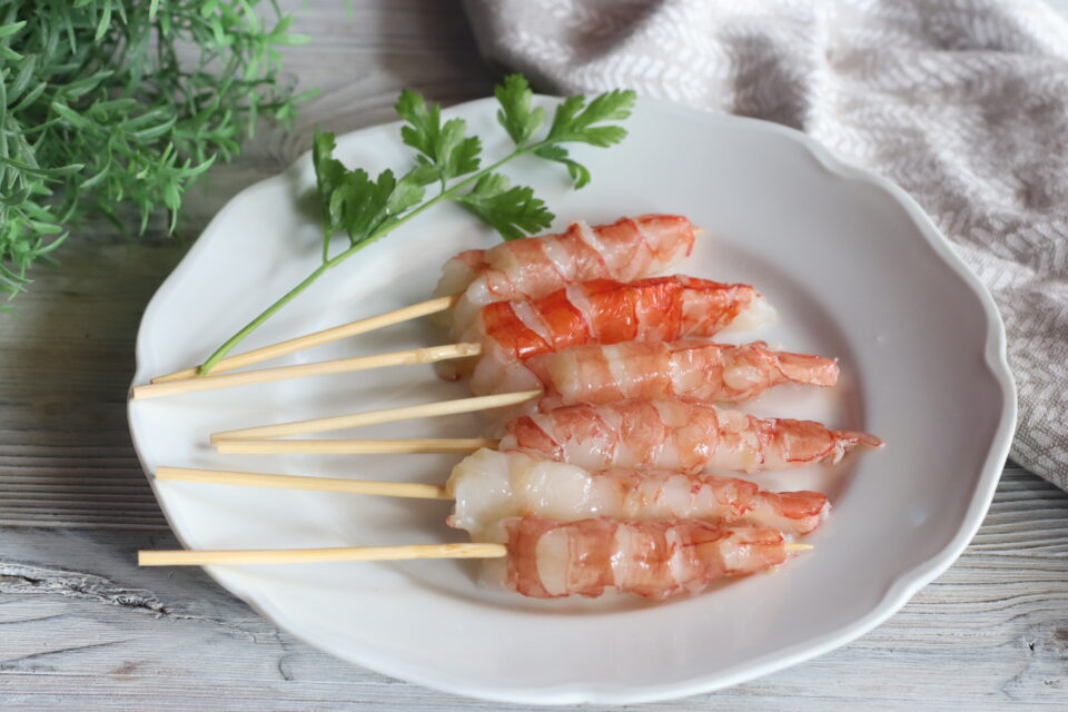 gamberoni panati su spiedini