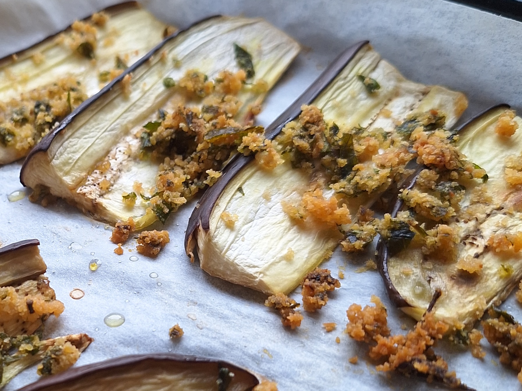 Spicchi di Melanzane gratinate al forno